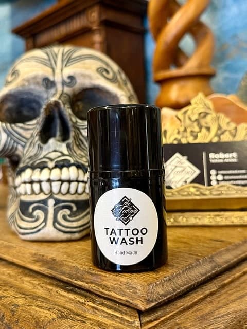 A bottle of the studio's hand-made tattoo wash